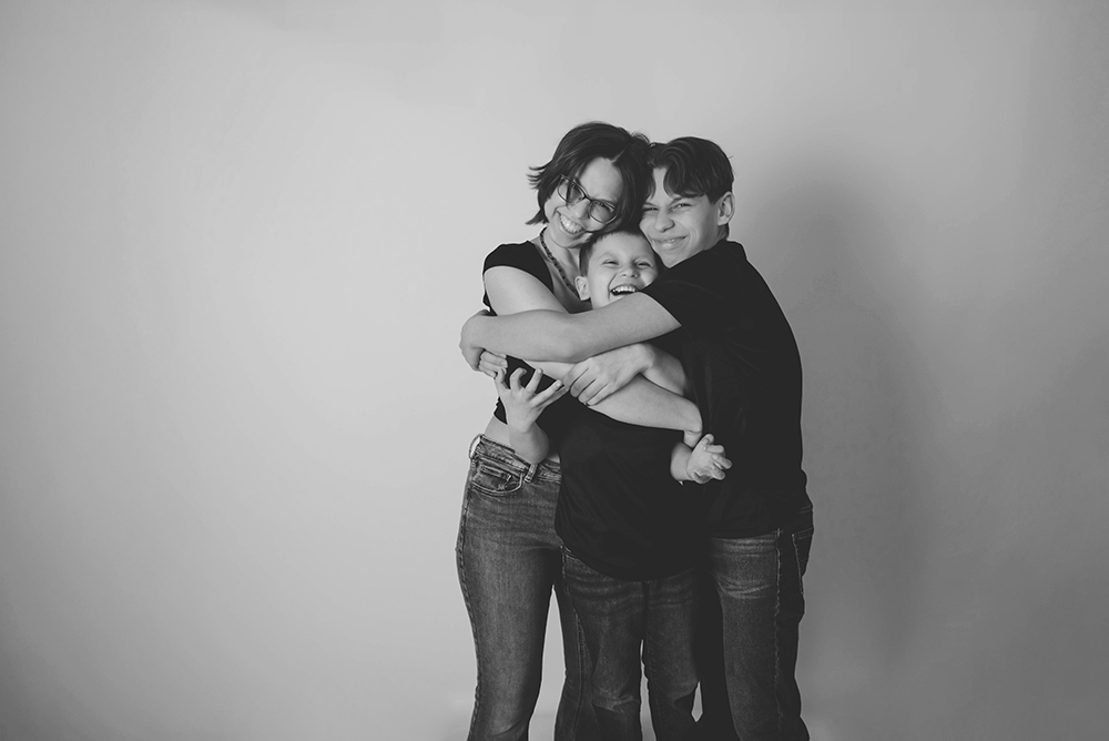 black and white images of children hugging