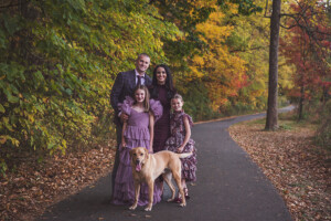 Family posed for a perfect fall portrait at Tyler State Park with Appletini Photography