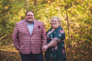 Well dressed couple posed in Core Creek Park