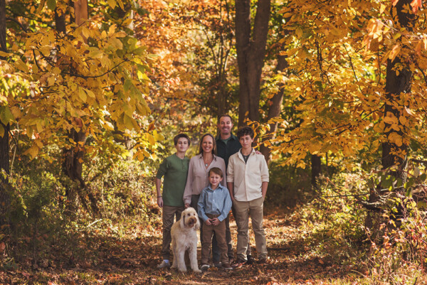 Family portraits on a golden fall path at Core Creek Park, Bucks County