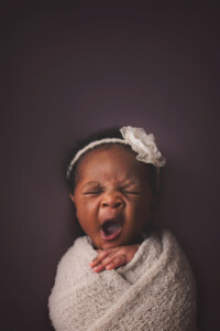 yawning newborn portrait capture in Bucks County, PA