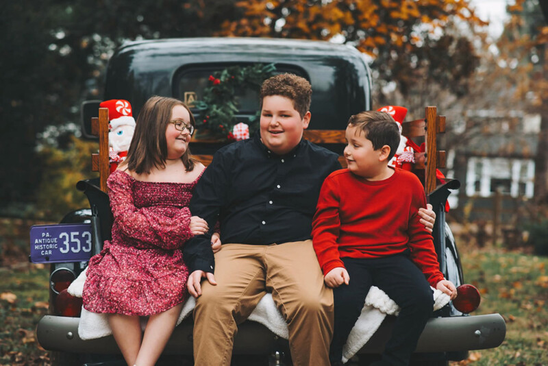 Candid outdoor holiday family photo in Yardley Pennsylvania