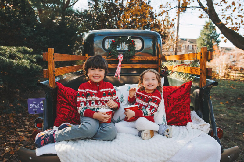 Candid outdoor holiday family photo in Yardley Pennsylvania