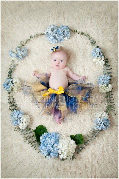 Child with Down syndrome showing personality during studio portrait Bucks County PA