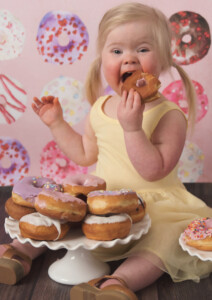 Close-up portrait of smiling child with Down syndrome Bucks County photography