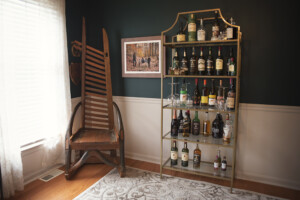 family prints displayed on the wall in the dining room