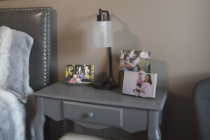 bedroom night stand with a set of 3 premium canvas prints