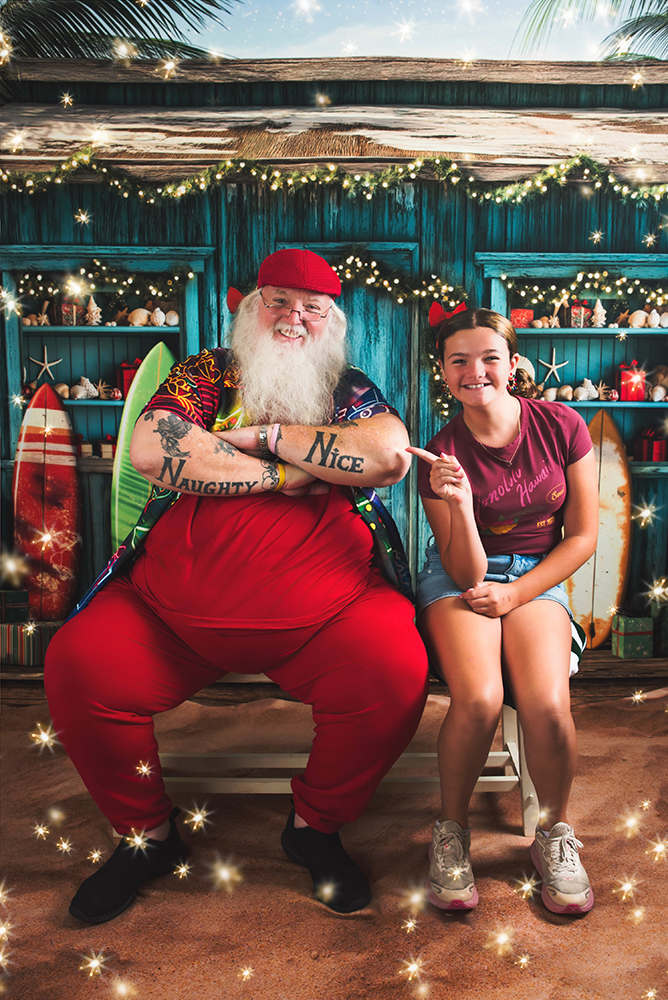 Santa Scott greeting guests during a summer community event