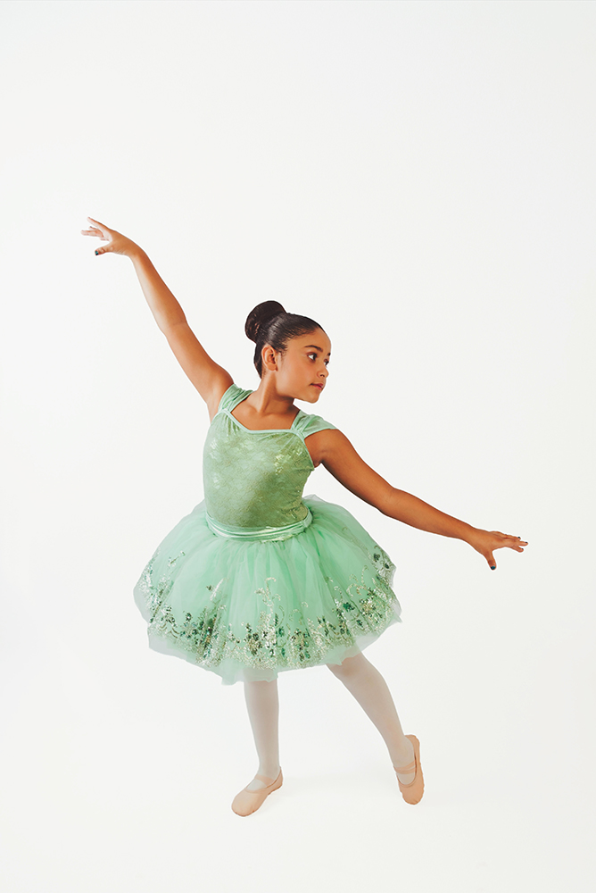 Dancer posing during a professional dance studio portrait session.